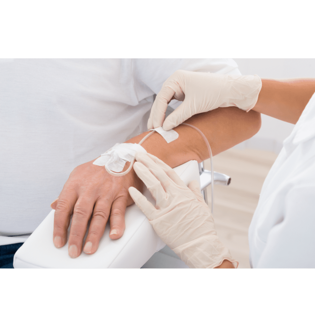 Close-up of a patient receiving IV sedation in preparation for a dental procedure at The Denture Company in Nampa, Idaho.